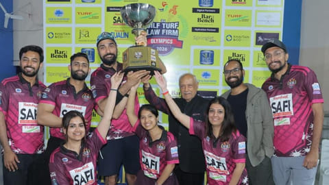 Champions AZB & Partners receiving the Trophy from Dr. Lalit Bhasin