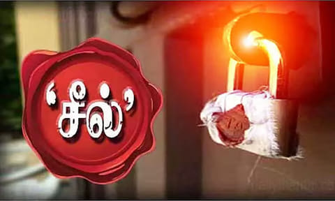 அரசு குடியிருப்பில் தி.மு.க. தேர்தல் அலுவலகம்: அதிகாரிகள் சீல் வைத்தனர்