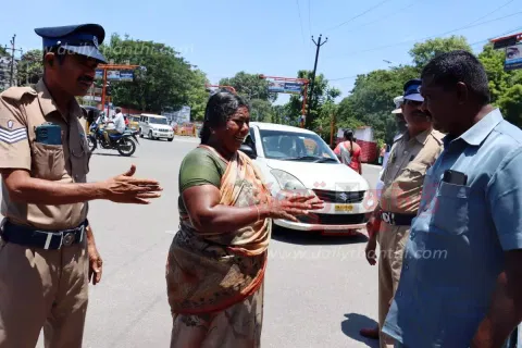 நிலத்தை அபகரிப்பு செய்ததாக பா.ஜனதா பிரமுகர் மீது புகார்: பெண் தீக்குளிக்க முயற்சி-கலெக்டர் அலுவலகத்தில் பரபரப்பு