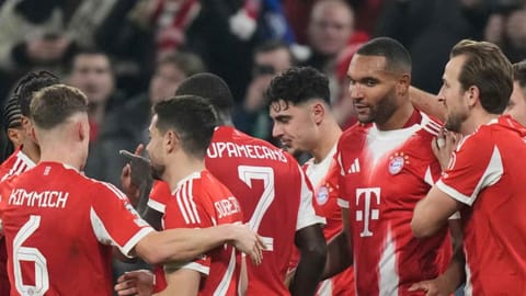 Bayern Munich players celebrate after Bayern's Jonathan Tah, second right, scored his side's third goal during the Champions League opening phase soccer match between FC Bayern Munich and Sporting CP in Munich, Germany, Tuesday, Dec. 9, 2025