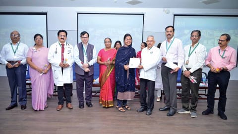 A PG student receiving appointment letter during the induction ceremony held at SRM Medical College Hospital and Research