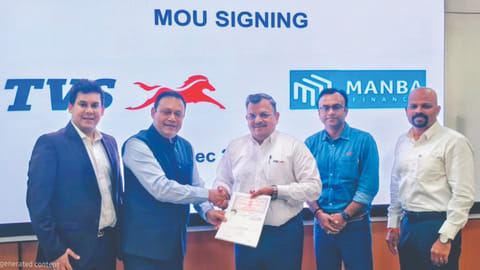 TVS Motor and Manba officials at the signing of an (MOU)