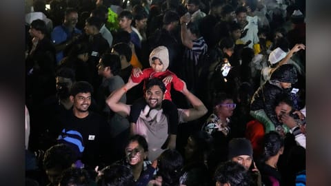 People celebrate on the occasion of New Year 2026, at Marina Beach in Chennai, Thursday, Jan. 1, 2026.