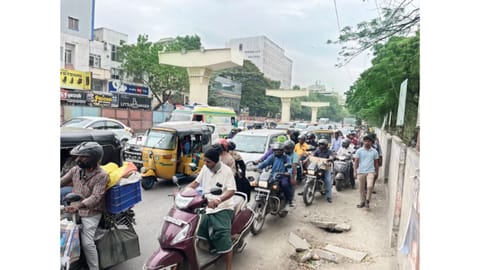 Pedestrians and two wheelers struggles to commute