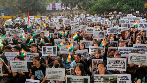 People from Manipur stage a protest against the violence