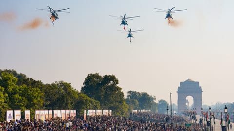 Four Mi-17 1V helicopters of the Indian Air Force�s (IAF) 129 Helicopter Unit perform a flypast in Dhwaj formation while showering petals over Kartavya Path during the 77th Republic Day Parade, in New Delhi, Monday, Jan. 26, 2026