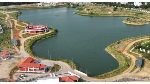 Aerial view of the rejuvenated Navalur lake and eco park