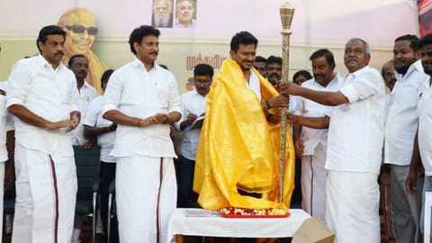 DMK leaders honouring Deputy Chief Minister Udhayanidhi Stalin with a 'sengol' in Thanjavur on Thursday