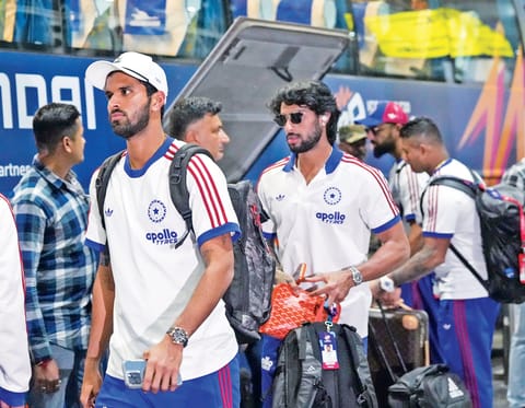 Washington Sundar and Tilak Varma leave the airport after the team's arrival in Kolkata on Friday