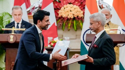 Prime Minister Narendra Modi and Canadian Prime Minister Mark Carney witness an MoU exchange between External Affairs Minister S Jaishankar and Canada Minister of International Trade Maninder Sidhu during a joint press meet, at Hyderabad House in New Delhi, Monday, March 2, 2026