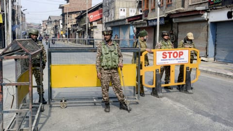 Security personnel keep vigil amid restrictions on movement of people in Kashmir valley as authorities apprehended protests against the killing of Iran's supreme leader Ayatollah Ali Khamenei in the US-Israeli airstrikes, in Srinagar
