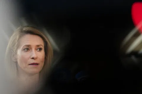 European Union foreign policy chief Kaja Kallas speaks with the media as she arrives for a meeting of EU foreign ministers at the European Council building in Brussels