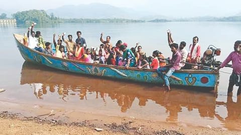 Kani tribals on a boat ride to cast votes in the 2024 LS polls