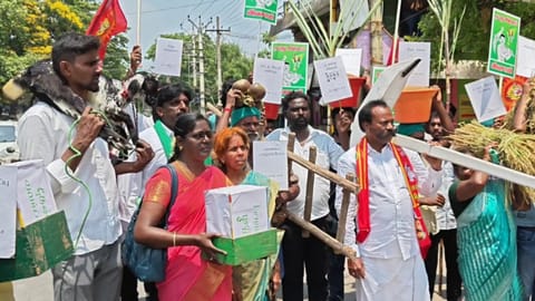 NTK's Maram Masilamani carries a plough before filing his nomination in Kancheepuram's Uthiramerur constituency on Monday
