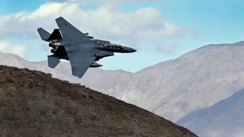 The Latest: Search on for missing crew member after 2 US planes go down in dramatic turn to Iran war
