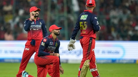 Bengaluru: From left, Royal Challengers Bengaluru's Virat Kohli, Devdutt Padikkal and wicketkeeper Jitesh Sharma during an Indian Premier League (IPL) 2026 T20 cricket match between Royal Challengers Bengaluru and Chennai Super Kings, in Bengaluru