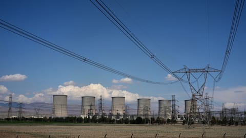 The Damavand power station is seen from a nearby road on the outskirts of Tehran, Iran, Tuesday, April 7, 2026.