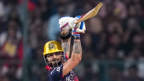 Royal Challengers Bengaluru's Virat Kohli plays a shot during the Indian Premier League (IPL) 2026 T20 cricket match between Royal Challengers Bengaluru and Lucknow Super Giants, at M Chinnaswamy Stadium in Bengaluru, Karnataka, Wednesday, April 15, 2026