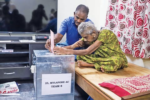 An 86-year-old woman from Mylapore exercising her franchise on Thursday after
postal voting for elderly people commenced in Chennai. The Election Commission has made the arrangement for voters aged 85 and above