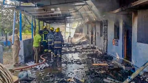 Firefighters at the site after a blast in a firecracker manufacturing unit, at Kattanarpatti in Virudhunagar, Tamil Nadu, Sunday, April 19, 2026