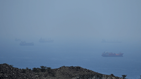 Tankers and bulk carriers anchored in the Strait of Hormuz, Saturday, April 18, 2026.