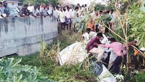 Car plunges into stream
