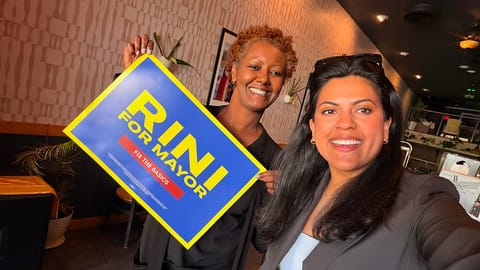 Rini Sampath (R)