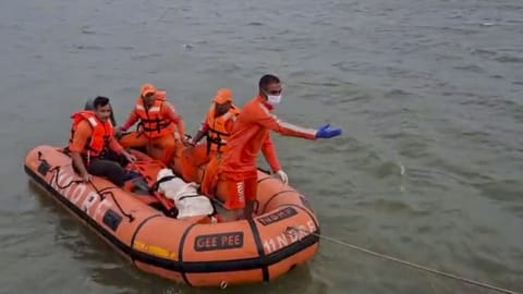 Rescue personnel conduct a search operation after the cruise boat tragedy that occurred on Thursday, in Jabalpur district, Madhya Pradesh, Sunday, May 3, 2026. The bodies of two boys were recovered on Saturday evening from the Bargi Dam in the district, raising the death toll in the tragedy to 11, while search continued for two missing persons.