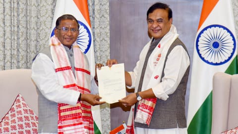 Assam Governor Lakshman Prasad Acharya with outgoing state Chief Minister Himanta Biswa Sarma during a meeting after the CM submits his resignation, at Raj Bhavan