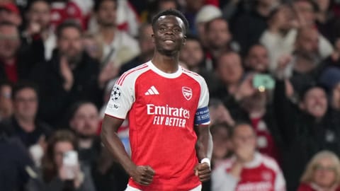 Arsenal’s Bukayo Saka celebrates after scoring the only goal of the clash against Atletico Madrid