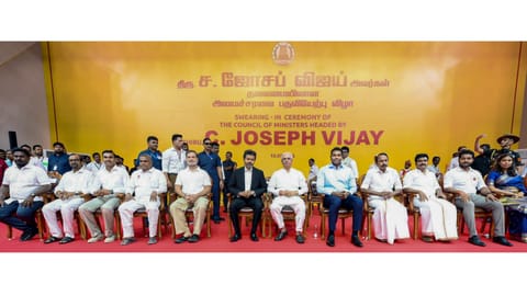 Tamil Nadu Governor Rajendra Arlekar along with Congress MP and Lok Sabha LoP Rahul Gandhi, newly-elected state Chief Minister and TVK chief C Joseph Vijay and the TVK Cabinet Ministers during the swearing-in ceremony, at Jawaharlal Nehru Stadium, in Chennai