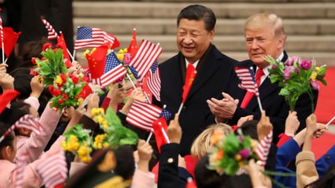 President Donald Trump and Chinese President Xi Jinping participate in a welcome ceremony at the Great Hall of the People in Beijing, China