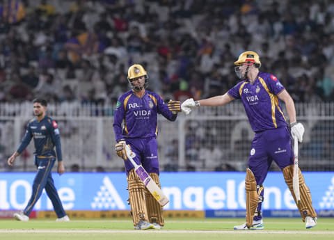 Kolkata Knight Riders' Angkrish Raghuvanshi, left, and Cameron Green interact between the wickets during an Indian Premier League (IPL) 2026 T20 cricket match between Kolkata Knight Riders and Gujarat Titans, in Kolkata, West Bengal, Saturday, May 16, 2026. (PTI Photo/Manvender Vashist Lav)(PTI05_16_2026_000489B) *** Local Caption ***