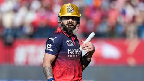 Royal Challengers Bengaluru's Virat Kohli walks back to the pavilion after his dismissal by Punjab Kings' Yuzvendra Chahal during the Indian Premier League (IPL) 2026 T20 cricket match between Punjab Kings and Royal Challengers Bengaluru, in Dharamshala, Himachal Pradesh, Sunday, May 17, 2026