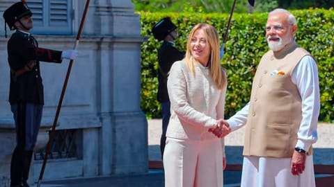 Prime Minister Narendra Modi interacts with Italian Prime Minister Giorgia Meloni, in Italy