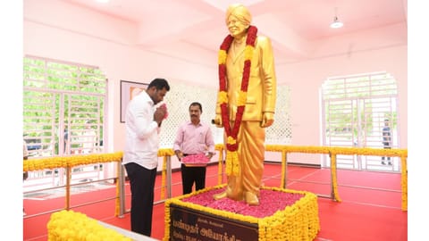 PWD Minister Aadhav Arjuna paying floral tributes to Pandit C Iyothee Thass in Chennai on Wednesday