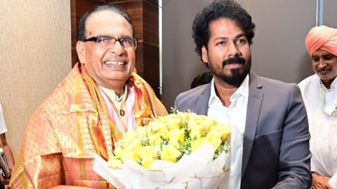 State Agriculture Minister R Vinoth with Shivraj Singh Chouhan in New Delhi