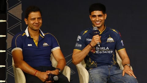 Gujarat Titans skipper Shubman Gill, right, with former England player and GT's director of cricket Vikram Solanki
