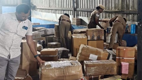 Police conduct searches at a parcel office in Coimbatore