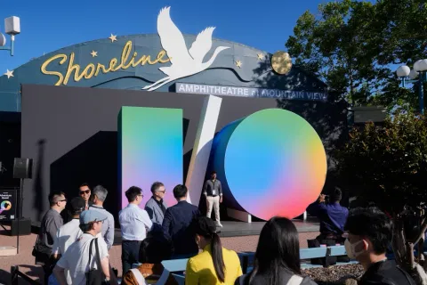 Attendees pose for photos before the keynote presentation at a Google I/O event in Mountain View, Calif., Tuesday, May 19, 2026.