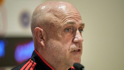 Afghanistan's head coach Richard Pybus addresses a press conference ahead of a Test cricket match against India, in Mullanpur, Friday, June 5, 2026
