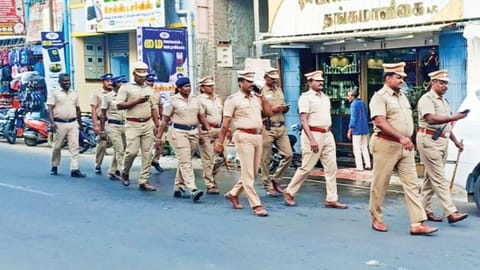 Police personnel on foot patrol in Thanjavur district