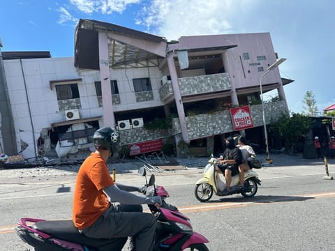A 7.8 magnitude quake in the Philippines kills at least 35, collapses buildings and triggers tsunami