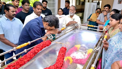 Tamil Nadu Chief Minister Vijay pays tribute to veteran director P Bharathiraja at his residence.