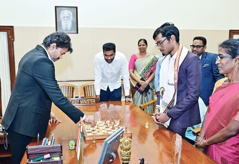 CM Vijay playing chess with Praggnanandhaa