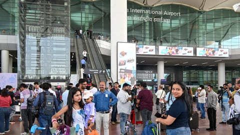 Passengers arrive at the Noida International Airport, in Jewar, Uttar Pradesh