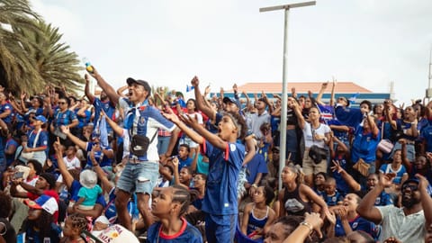 Fans react as they watch a broadcast of the World Cup Group H soccer match between Cape Verde and Spain at a viewing center in Mindelo, São Vicente, Cape Verde