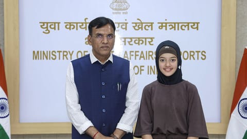 Union Minister of Youth Affairs and Sports Mansukh Mandaviya during a meeting with Indian racer Atiqa Mir.