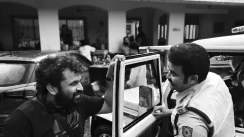 Director Tharunmoorthy with Mohanlal