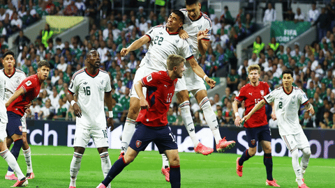 Mexico's Guillermo Martinez and Cesar Montes in action with Czech Republic's Lukas Cerv
